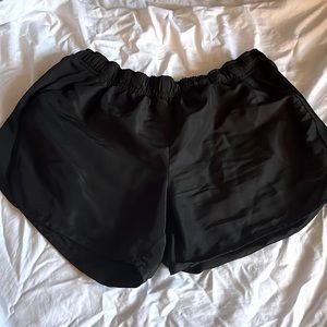 Black shorts with fitted waste